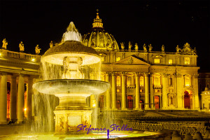 Petersdom at night with illuminated fountain