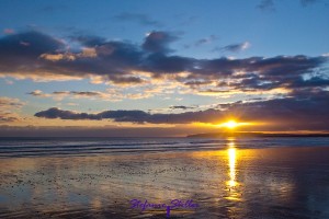 Sonnenuntergang am Camber Sands Beach bei Ebbe